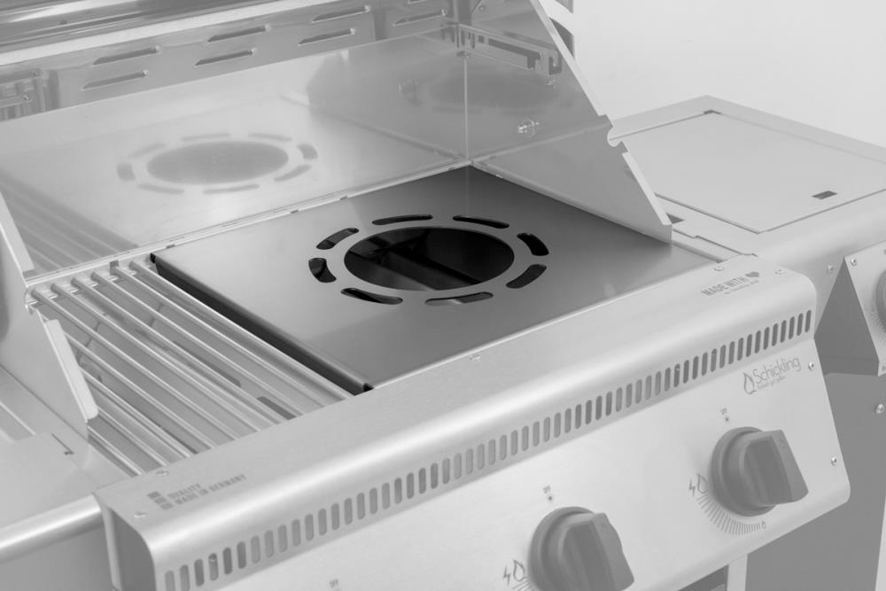 Die Wokauflage L kann ganz einfach in den modularen Rost eingesetzt werden