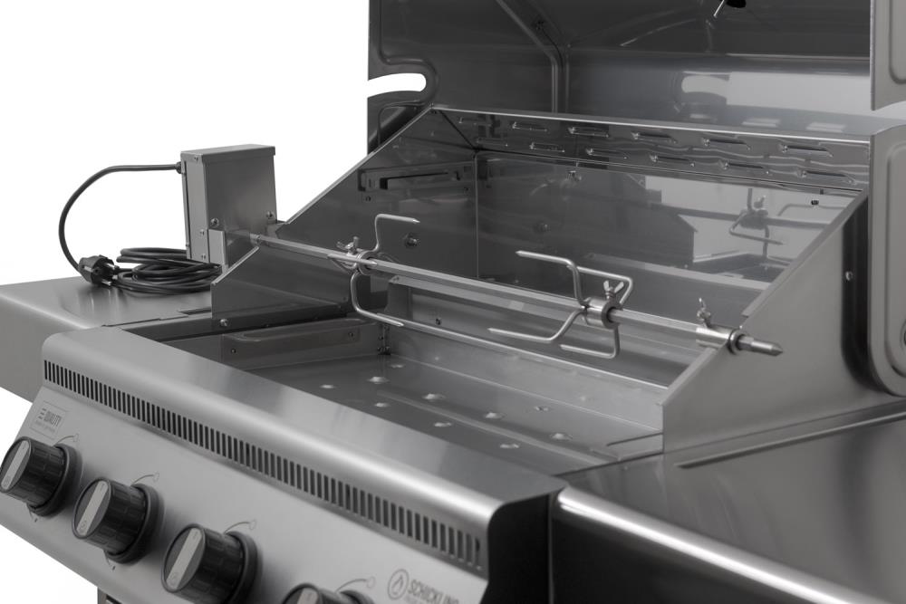 Seitlicher Blick in den Garraum des Hermann XL mit Drehspieß und Heckling