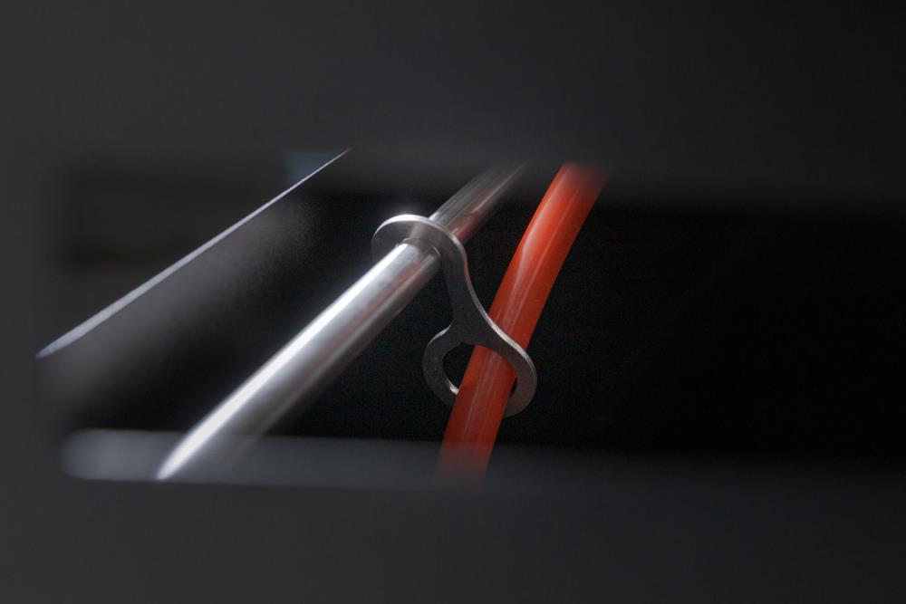 Haken hält Gasschlauch an Ort und Stelle