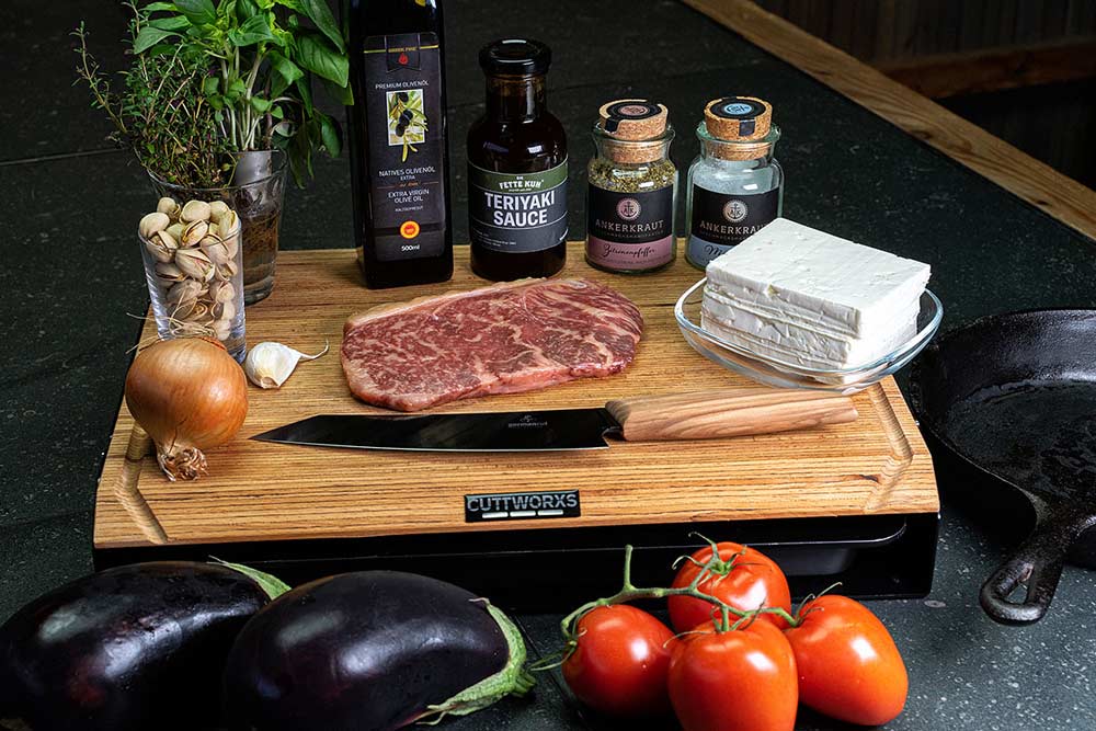 Auberginenröllchen mit Ziegenkäse und Tomaten-Topping