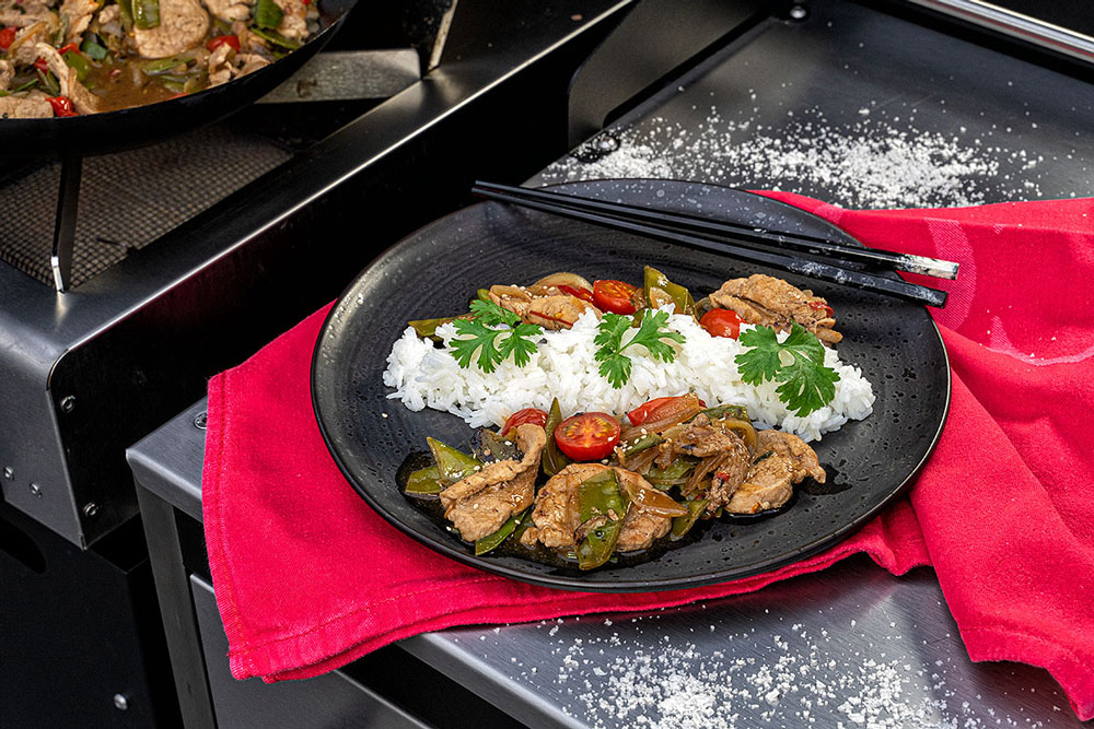 Schweinefilet und Zuckerschoten aus dem Wok